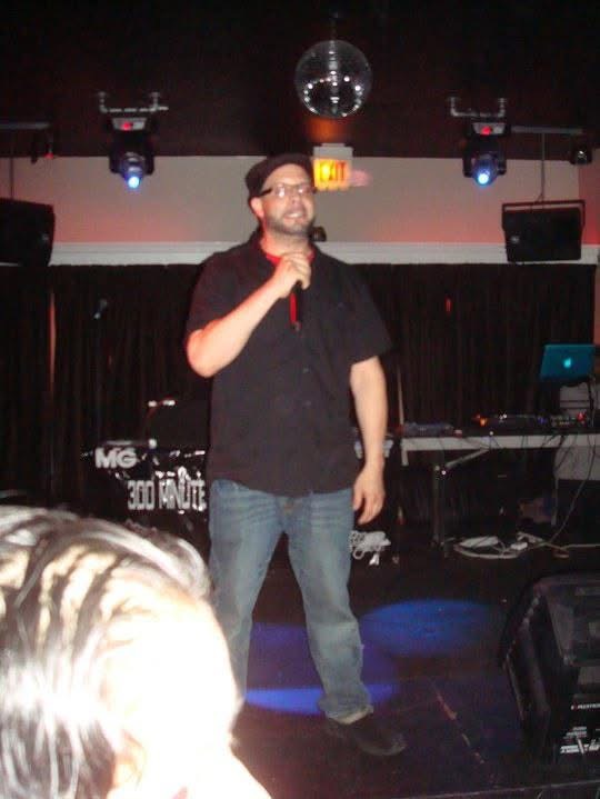 M.C. DaNova performing live on stage